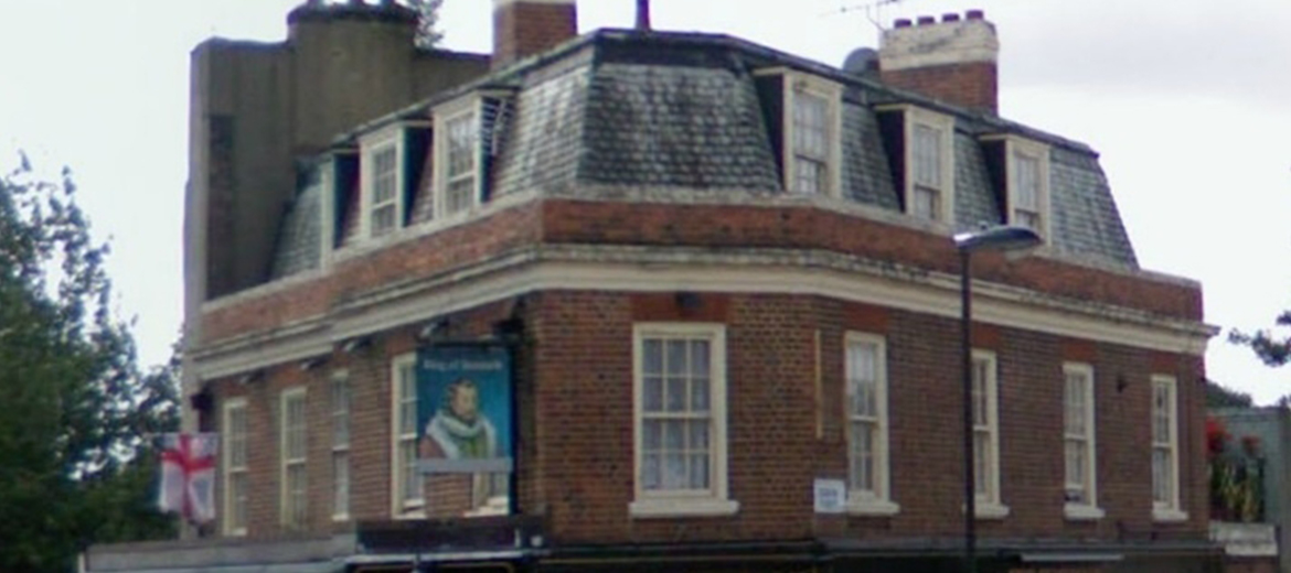 An old before-photo of windows on a building on Cloudesley Road, N1, Islington, London.